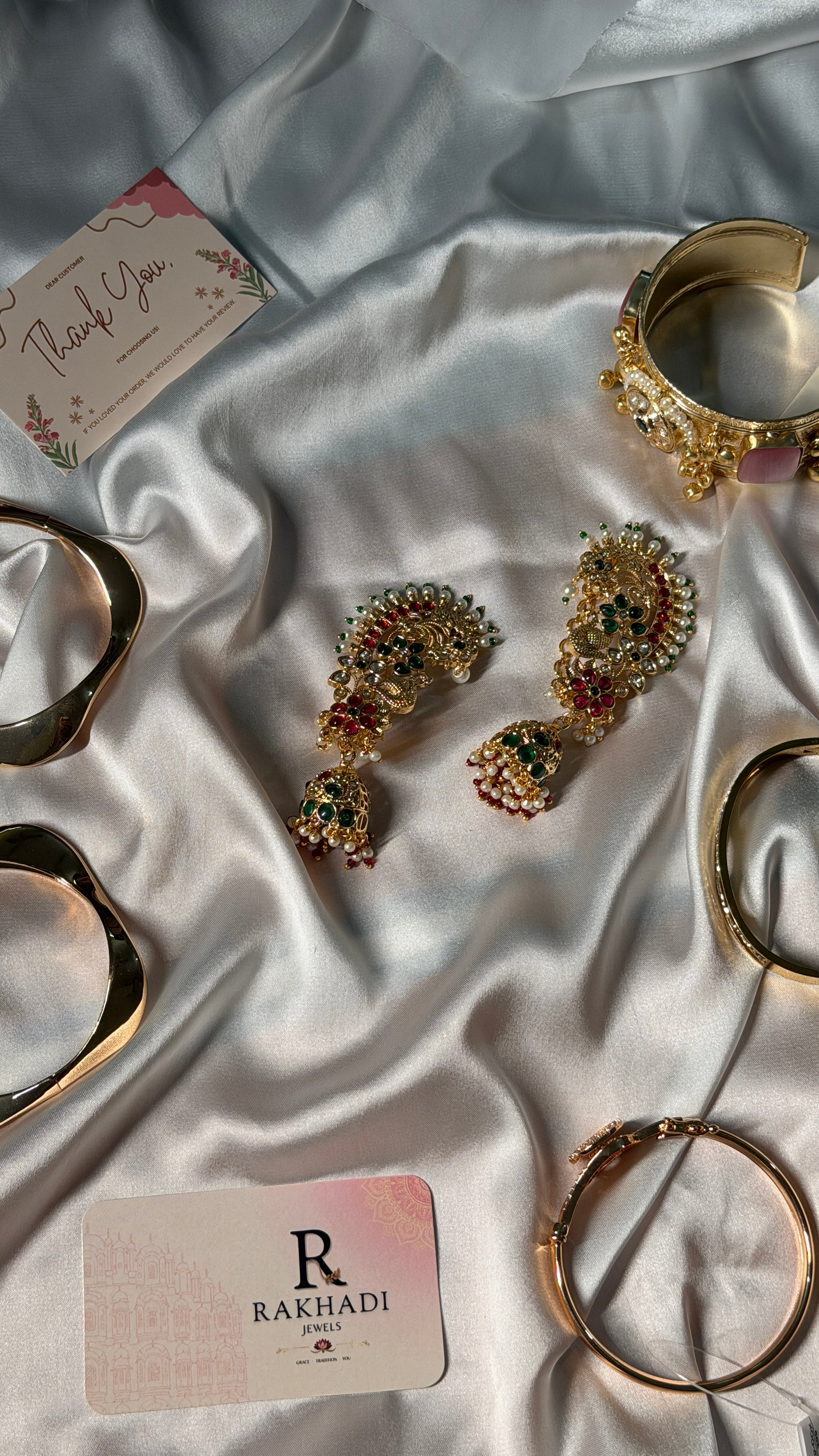 Gold plated jhumka earrings