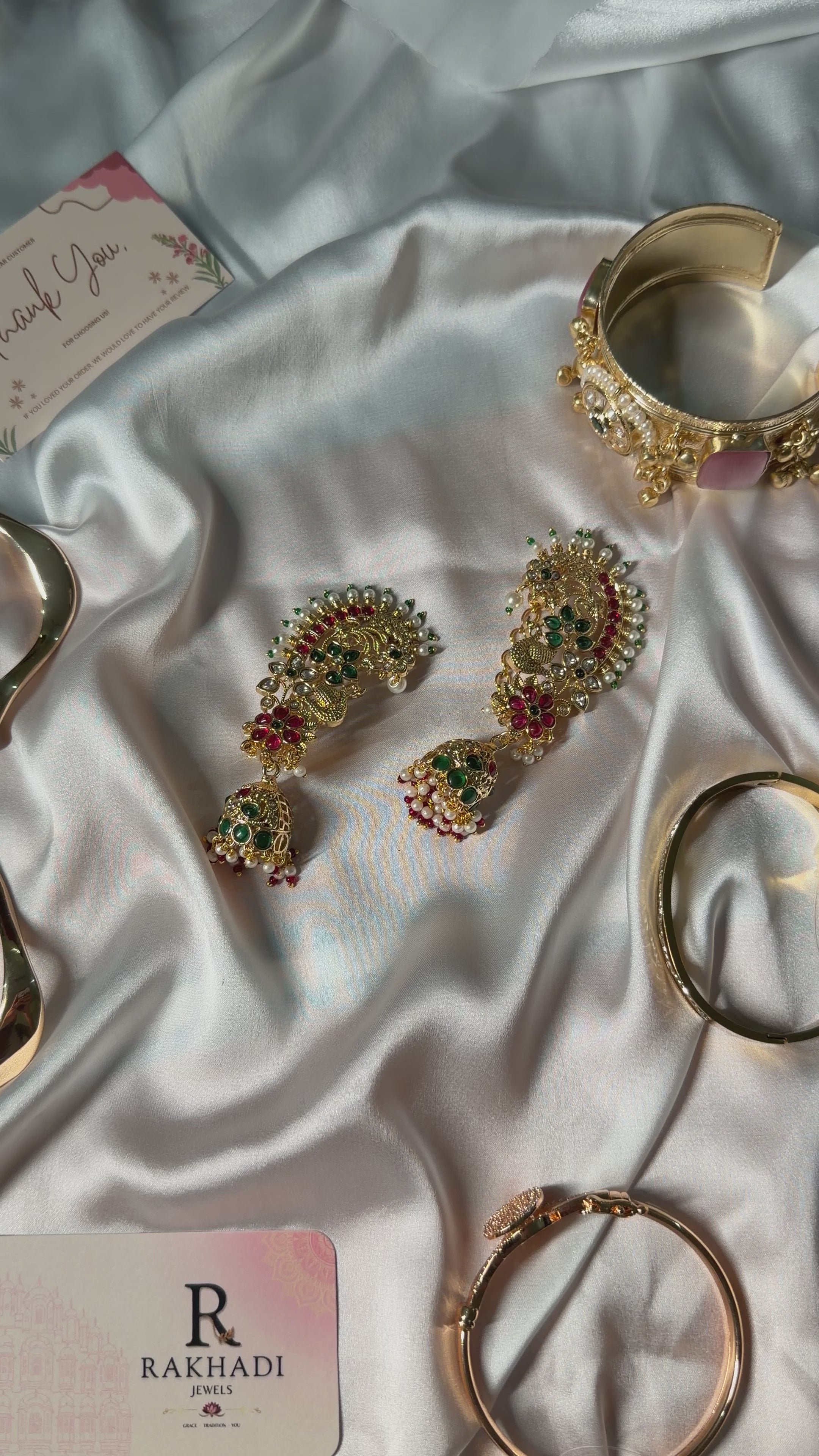 Gold plated jhumka earrings